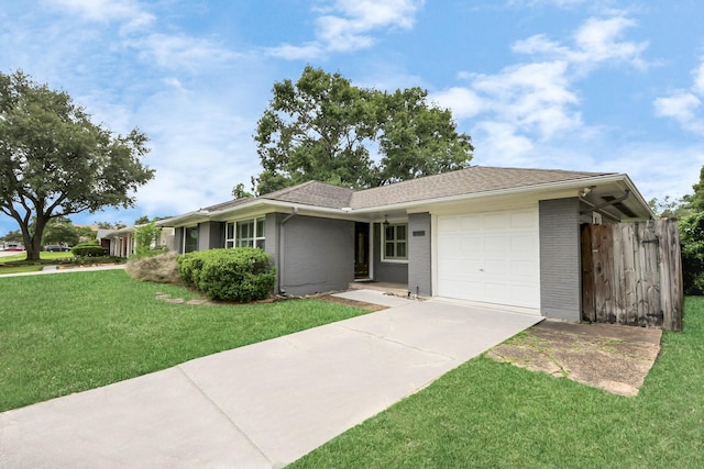 1831 Watercrest Dr, Houston, TX 77008 - ranch-style home featuring an attached garage, concrete driveway, a front lawn, and brick siding
