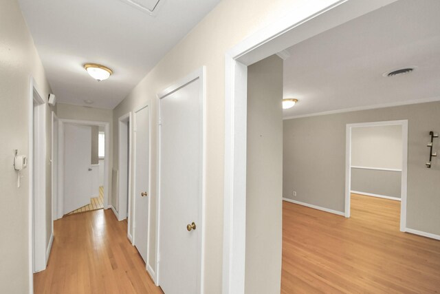 1831 Watercrest Dr, Houston, TX 77008 - corridor featuring light wood-type flooring and baseboards