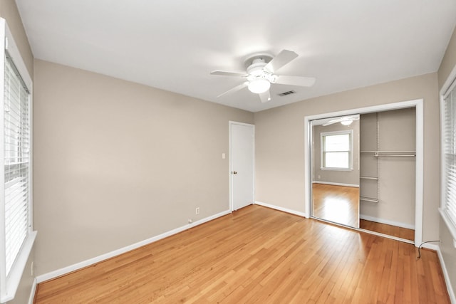 1831 Watercrest Dr, Houston, TX 77008 - unfurnished bedroom with light wood-style flooring, baseboards, a closet, and a ceiling fan