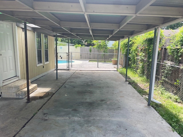 5311 Gano St, Houston, TX 77009 - fenced backyard with a carport and a patio area