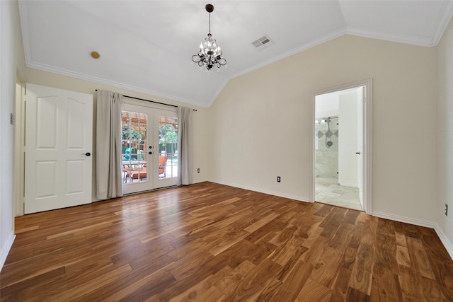 3006 Nickleby Ct, Katy, TX 77494 - unfurnished living room with lofted ceiling, french doors, wood finished floors, a chandelier, and crown molding
