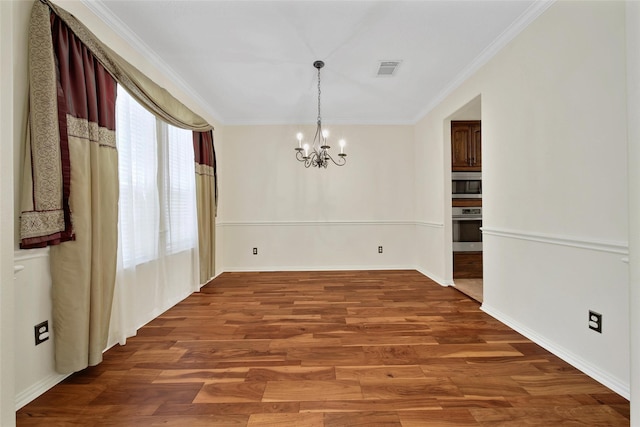 3006 Nickleby Ct, Katy, TX 77494 - unfurnished dining area featuring a chandelier, wood finished floors, ornamental molding, and baseboards