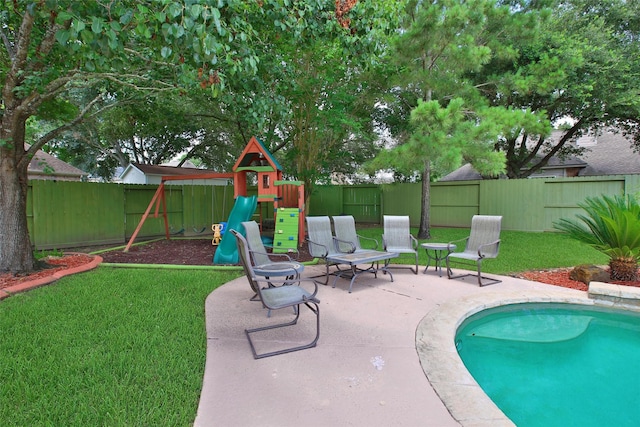 3006 Nickleby Ct, Katy, TX 77494 - view of swimming pool featuring a playground and a patio area