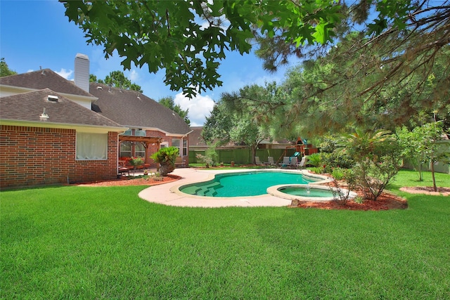 3006 Nickleby Ct, Katy, TX 77494 - view of swimming pool with a patio and a pool with connected hot tub