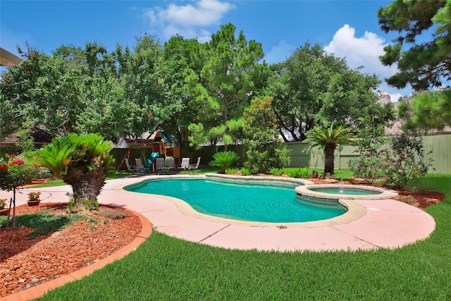3006 Nickleby Ct, Katy, TX 77494 - view of swimming pool featuring a playground and a pool with connected hot tub