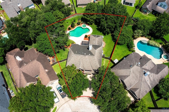 3006 Nickleby Ct, Katy, TX 77494 - aerial perspective of suburban area with a pool area