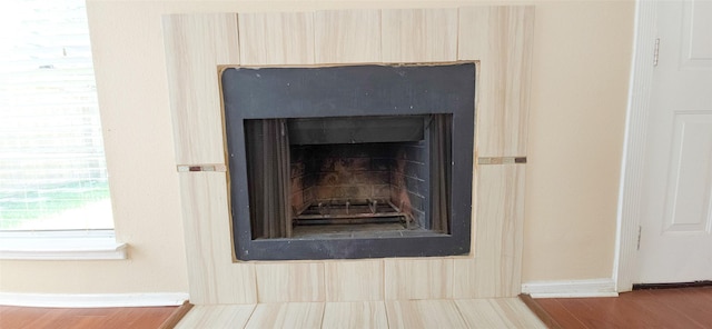 1538 Ridgebriar Dr, Houston, TX 77014 - detailed view of a fireplace and wood finished floors