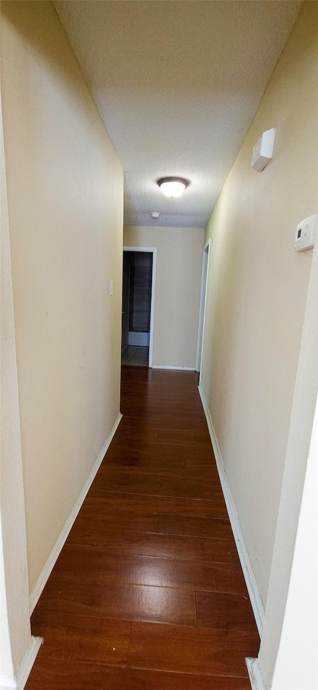 1538 Ridgebriar Dr, Houston, TX 77014 - corridor with wood-type flooring and baseboards