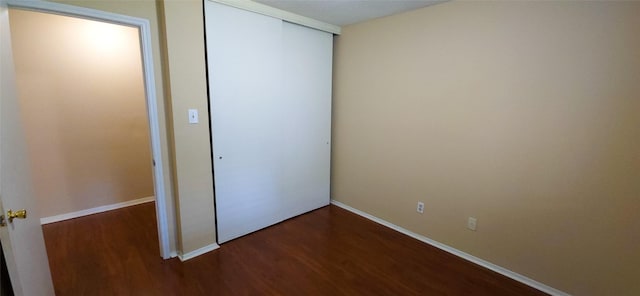 1538 Ridgebriar Dr, Houston, TX 77014 - unfurnished bedroom featuring wood finished floors and a closet