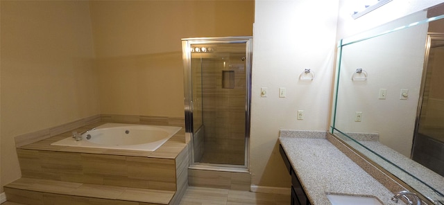 1538 Ridgebriar Dr, Houston, TX 77014 - bathroom featuring a garden tub, vanity, and a stall shower