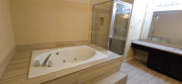 1538 Ridgebriar Dr, Houston, TX 77014 - full bathroom with a jetted tub, tiled shower, and vanity