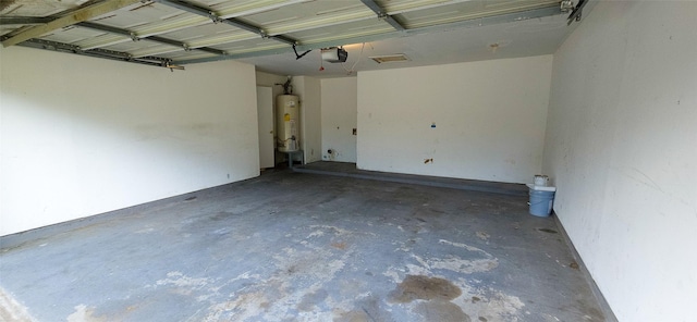 1538 Ridgebriar Dr, Houston, TX 77014 - garage with a garage door opener and gas water heater