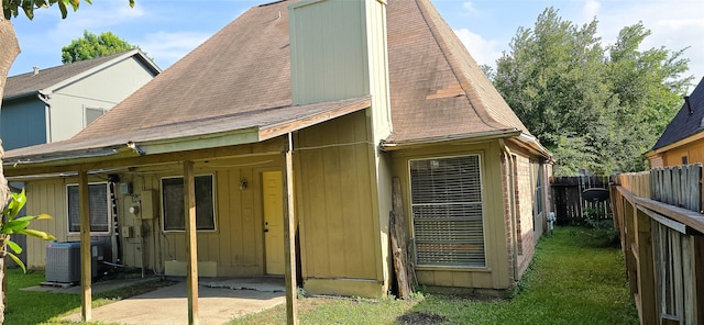 1538 Ridgebriar Dr, Houston, TX 77014 - back of house with a patio and roof with shingles