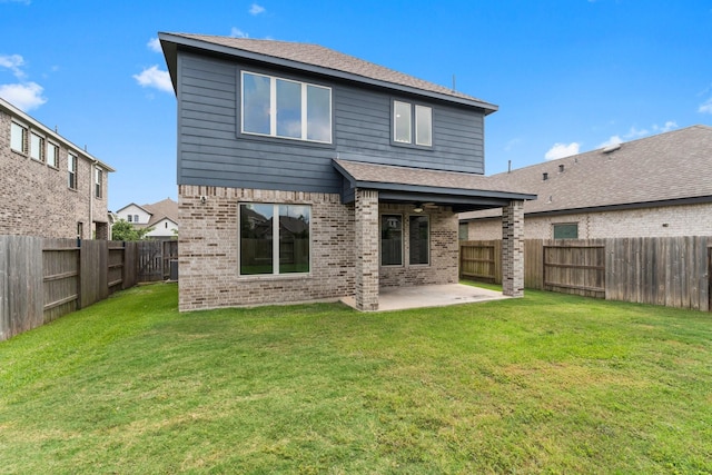 15739 Cairnwell Bend Dr, Humble, TX 77346 - back of property featuring brick siding, a patio, roof with shingles, and ceiling fan