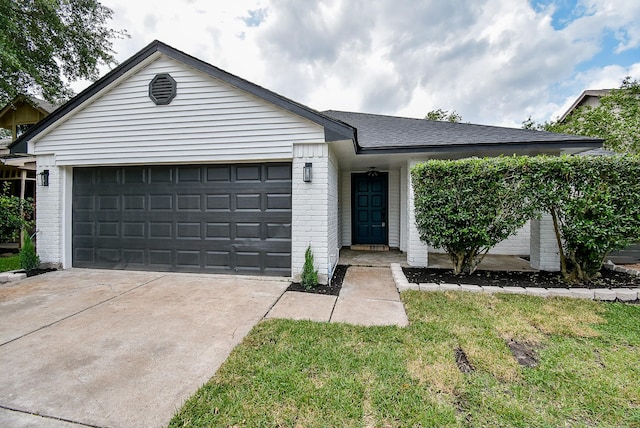 2012 Hickory Glen Dr, Missouri City, TX 77489 - ranch-style home with brick siding, an attached garage, and concrete driveway