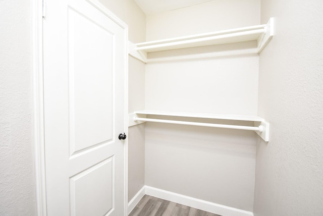 2012 Hickory Glen Dr, Missouri City, TX 77489 - walk in closet with wood finished floors