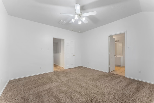 3 E Summerhaze Cir, Spring, TX 77382 - unfurnished bedroom featuring light carpet, baseboards, ensuite bathroom, ceiling fan, and lofted ceiling