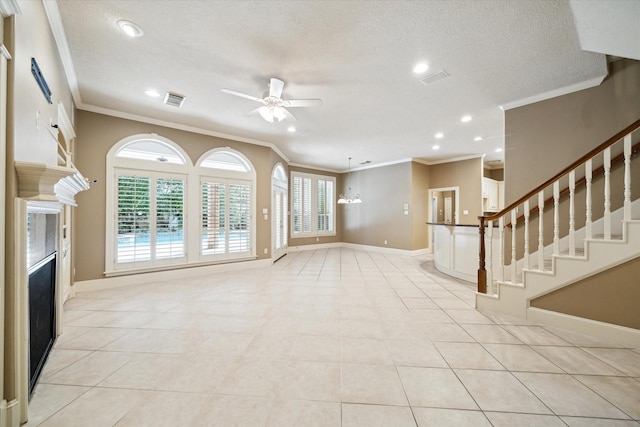 1615 Lake Wilderness Ln, Kingwood, TX 77345 - unfurnished living room featuring ornamental molding, a ceiling fan, a glass covered fireplace, recessed lighting, and baseboards