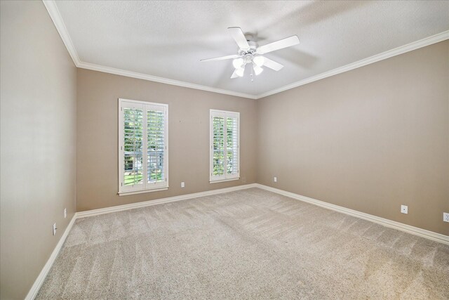 1615 Lake Wilderness Ln, Kingwood, TX 77345 - carpeted spare room featuring ceiling fan, ornamental molding, baseboards, and a textured ceiling