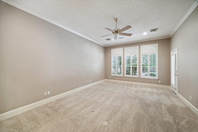 1615 Lake Wilderness Ln, Kingwood, TX 77345 - empty room with ceiling fan, crown molding, baseboards, carpet flooring, and a textured ceiling