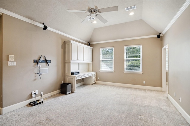 1615 Lake Wilderness Ln, Kingwood, TX 77345 - unfurnished office featuring ceiling fan, light colored carpet, ornamental molding, lofted ceiling, and baseboards
