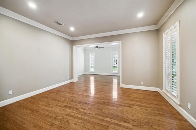 1615 Lake Wilderness Ln, Kingwood, TX 77345 - unfurnished room featuring crown molding, wood finished floors, baseboards, recessed lighting, and a ceiling fan