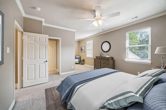 1615 Lake Wilderness Ln, Kingwood, TX 77345 - bedroom featuring carpet flooring, ornamental molding, baseboards, a ceiling fan, and a textured ceiling