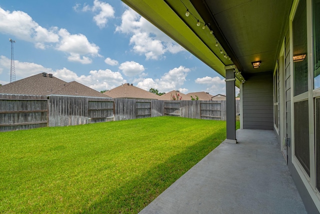 14370 S Summerchase Cir, Willis, TX 77318 - view of yard with a patio