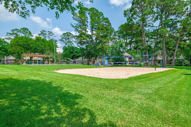 14370 S Summerchase Cir, Willis, TX 77318 - view of community with a lawn and volleyball court