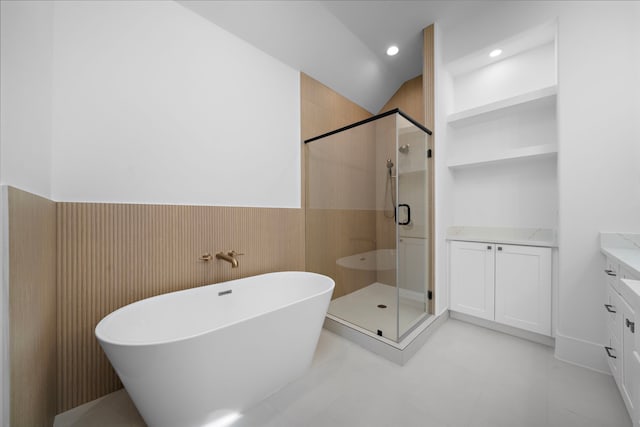 224 W 23rd St Unit B, Houston, TX 77008 - full bathroom featuring vanity, a freestanding tub, a stall shower, a wainscoted wall, and recessed lighting