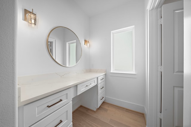 224 W 23rd St Unit B, Houston, TX 77008 - bathroom with vanity, wood finished floors, and baseboards