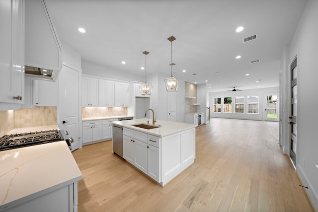 224 W 23rd St Unit B, Houston, TX 77008 - kitchen featuring a sink, stainless steel dishwasher, light wood-style flooring, recessed lighting, and decorative backsplash