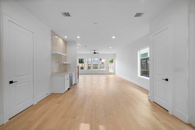 224 W 23rd St Unit B, Houston, TX 77008 - unfurnished living room with light wood finished floors, recessed lighting, a ceiling fan, and baseboards
