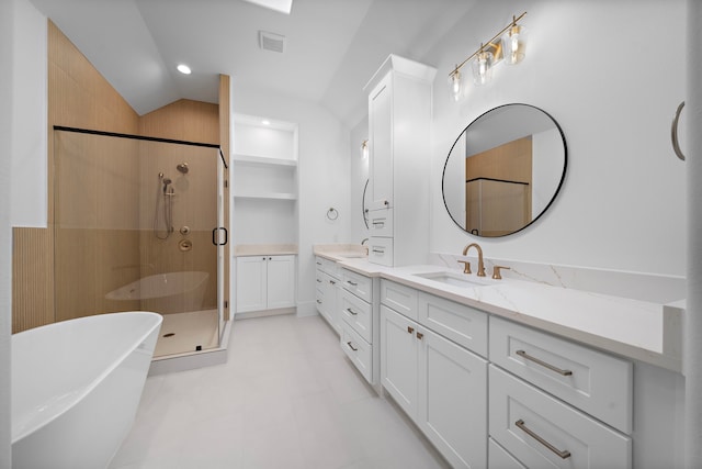 224 W 23rd St Unit B, Houston, TX 77008 - bathroom with a shower stall, vanity, vaulted ceiling, and a freestanding bath