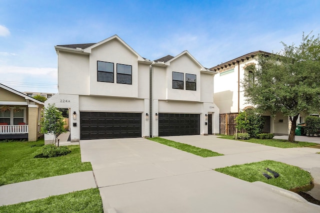 224 W 23rd St Unit B, Houston, TX 77008 - view of front of house with a garage, stucco siding, and concrete driveway