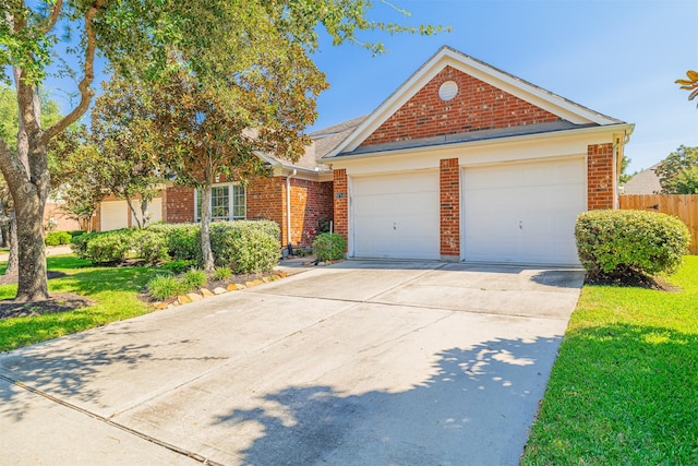 8714 Ridgebury Cir, Houston, TX 77095 - view of front of house with brick siding and driveway