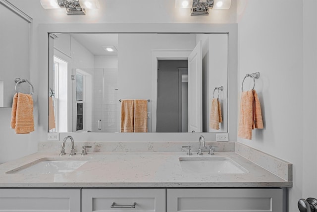 2604 E Seaside Dr, Galveston, TX 77550 - bathroom featuring double vanity and a stall shower