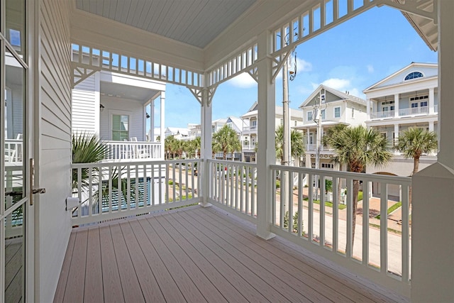 2604 E Seaside Dr, Galveston, TX 77550 - wooden deck featuring a residential view