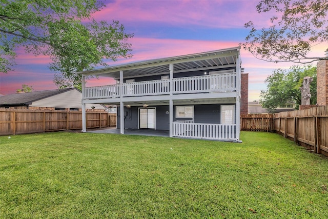 15830 Pipers View Dr, Houston, TX 77598 - back of house at dusk featuring a patio