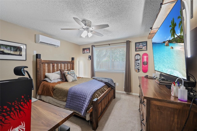 23910 Spring Day Ln, Spring, TX 77373 - bedroom with an AC wall unit, light carpet, a ceiling fan, baseboards, and a textured ceiling