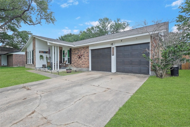 23910 Spring Day Ln, Spring, TX 77373 - single story home featuring brick siding, a garage, driveway, a front yard, and covered porch