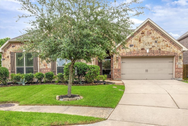 1136 Hancock Springs Ln, Friendswood, TX 77546 - view of front of property featuring concrete driveway, a garage, brick siding, and a front lawn