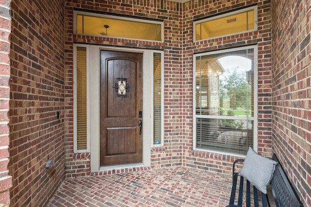 1136 Hancock Springs Ln, Friendswood, TX 77546 - entrance to property featuring brick siding and covered porch