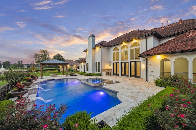 19 Sanctuary Trl, Missouri City, TX 77459 - view of pool with a gazebo, a patio area, and a pool with connected hot tub