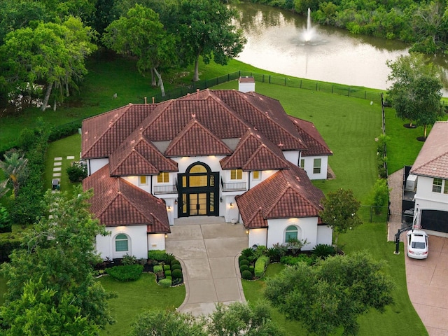 19 Sanctuary Trl, Missouri City, TX 77459 - view of subject property featuring a nearby body of water