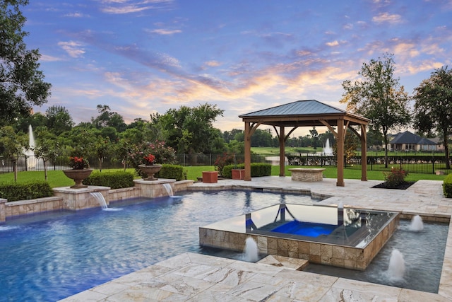 19 Sanctuary Trl, Missouri City, TX 77459 - view of swimming pool featuring a gazebo, a pool with connected hot tub, and a patio area
