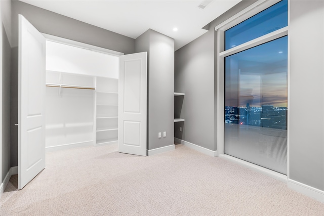 4521 San Felipe St Unit 2601, Houston, TX 77027 - unfurnished bedroom with carpet flooring, baseboards, and recessed lighting