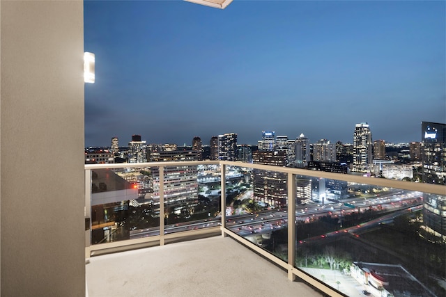 4521 San Felipe St Unit 2601, Houston, TX 77027 - balcony at twilight featuring a view of city lights