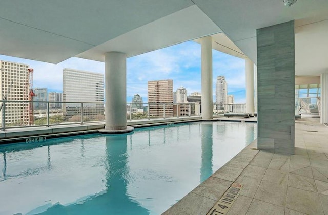 4521 San Felipe St Unit 2601, Houston, TX 77027 - community pool featuring a view of skyline