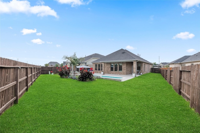 29510 Enchanted Breeze Ln, Katy, TX 77494 - rear view of property with brick siding and a patio area